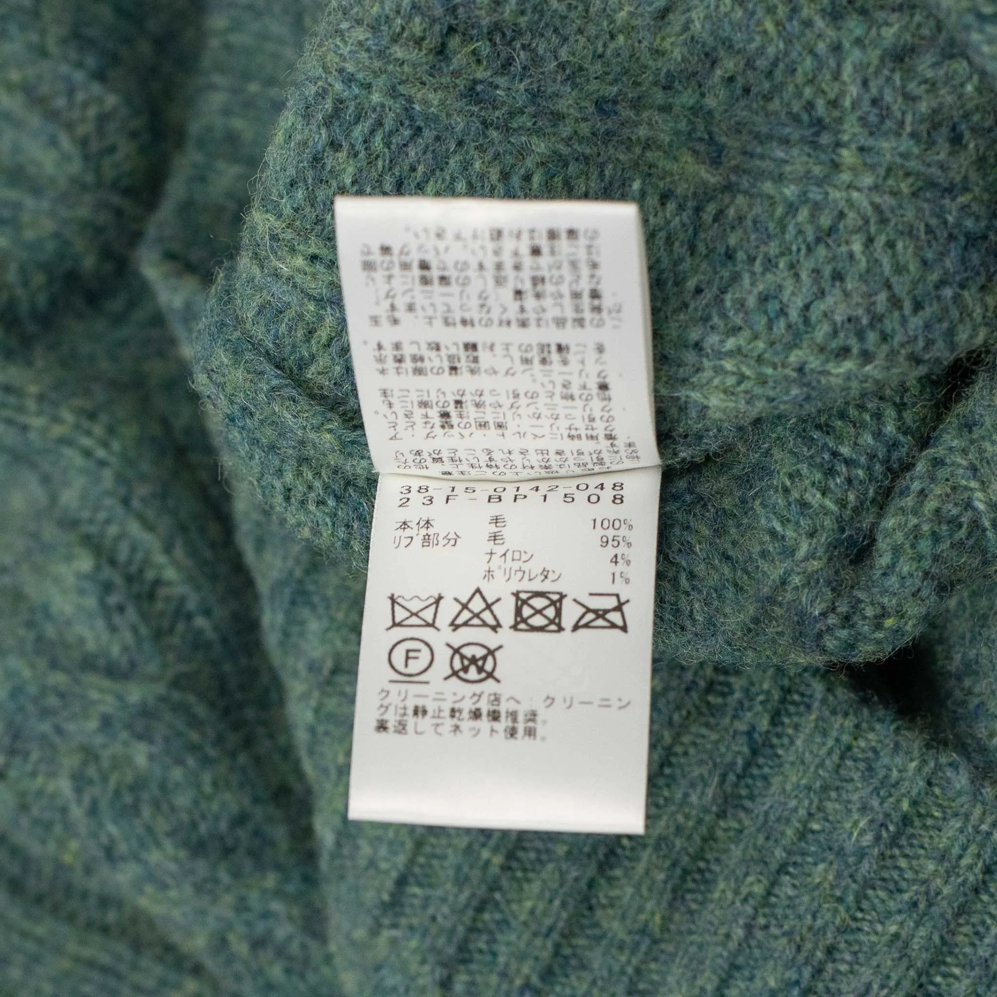 Cable crewneck sweater in sea green wool