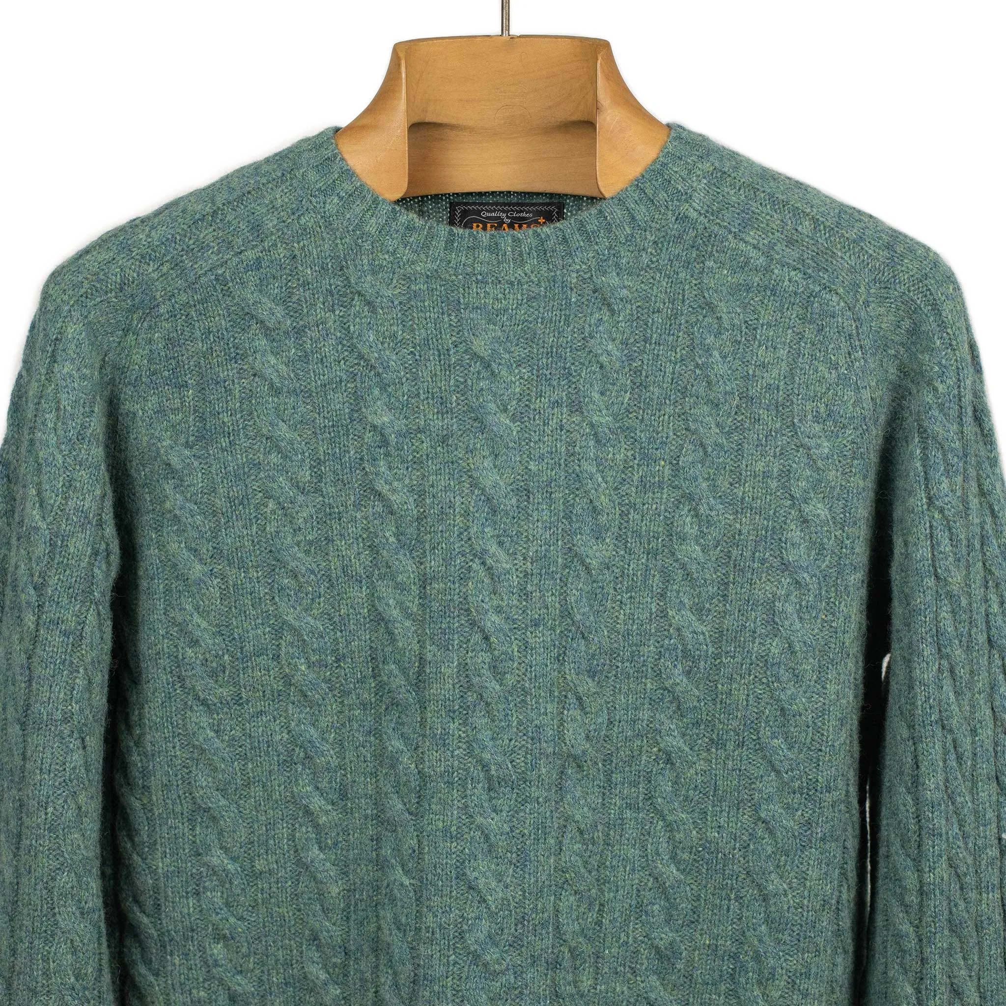 Cable crewneck sweater in sea green wool